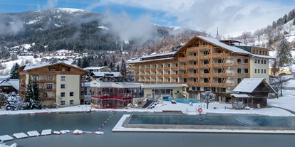 Wellnessurlaub - Ladestation Elektroauto - Eden (Glödnitz) - Winteransicht  - Hotel Pulverer