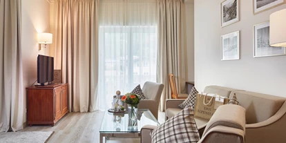 Wellnessurlaub - Day SPA - Altenmarkt im Pongau - Moderne alpine Eleganz und Lifestyle – neu definiert. Durch die ruhige und zentrale Lage von Bad Hofgastein bietet Ihnen das 4-Sterne Sport-, SPA- und Gesundheitshotel regionale Authentizität zeitgemäß interpretiert. - Das Alpenhaus Gasteinertal