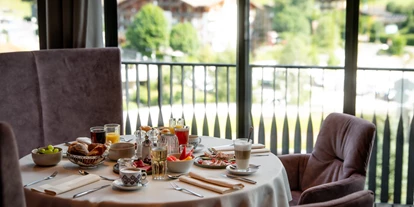 Wellnessurlaub - Babysitterservice - Frühstückstisch - Good Life Resort Riederalm