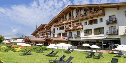 Wellnessurlaub - Ruhpolding - Hotel Sonne im Sommer mit Garten und Liegewiese - Hotel Sonne 4*Superior