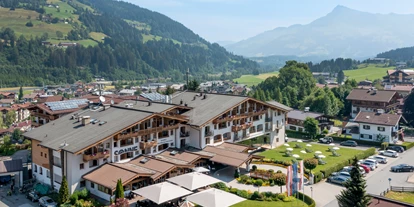 Wellnessurlaub - Ruhpolding - Das Hotel Sonne von außen im Sommer - Hotel Sonne 4*Superior