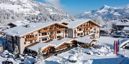 Wellnessurlaub - Ruhpolding - Das Hotel Sonne im Winter mit direktem Zugang zum Wintersportparadies der Kitzbüheler Alpen. - Hotel Sonne 4*Superior