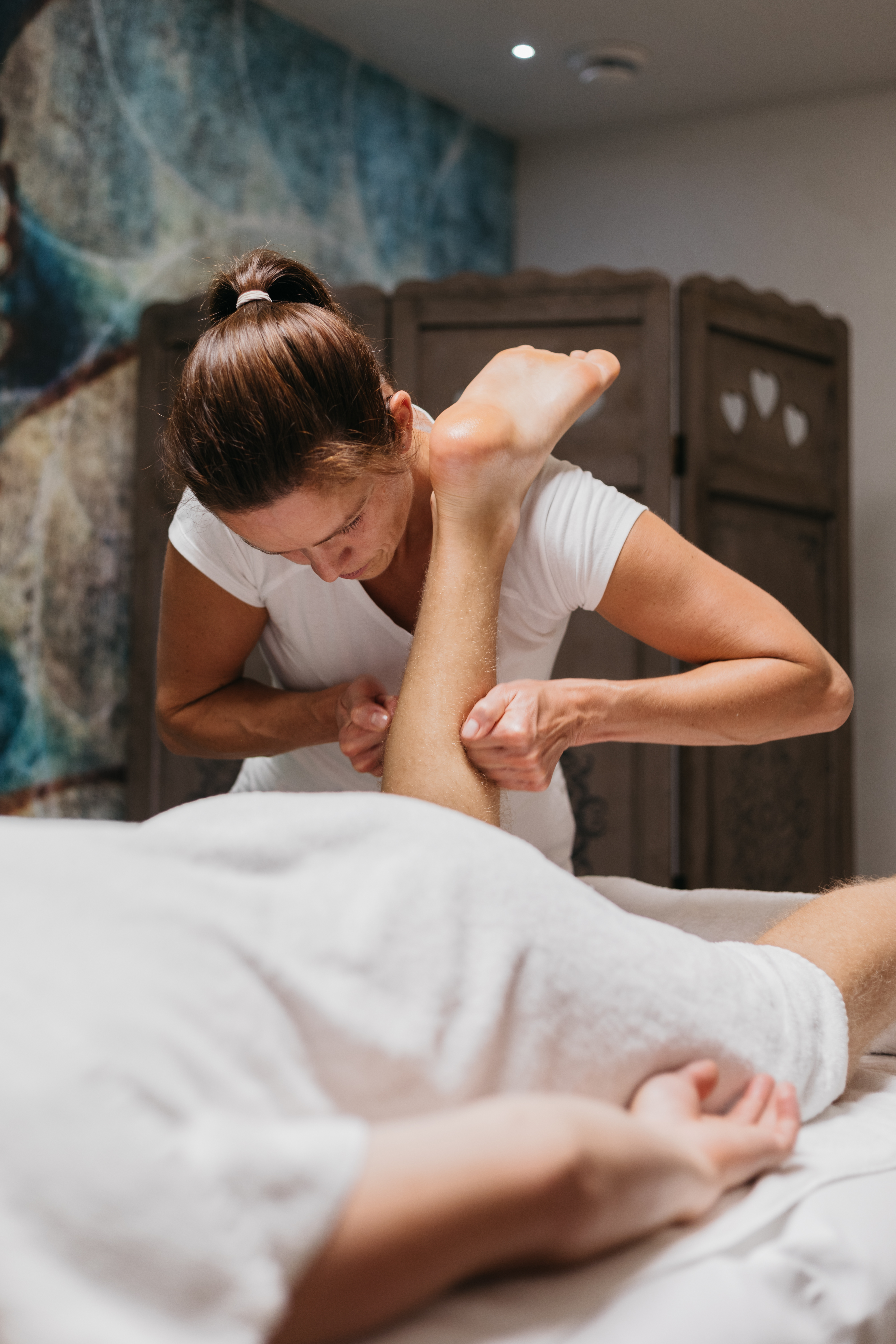 Alpinhotel Berghaus Massagen im Detail Wadl-Schmankerl - für leichte Beine