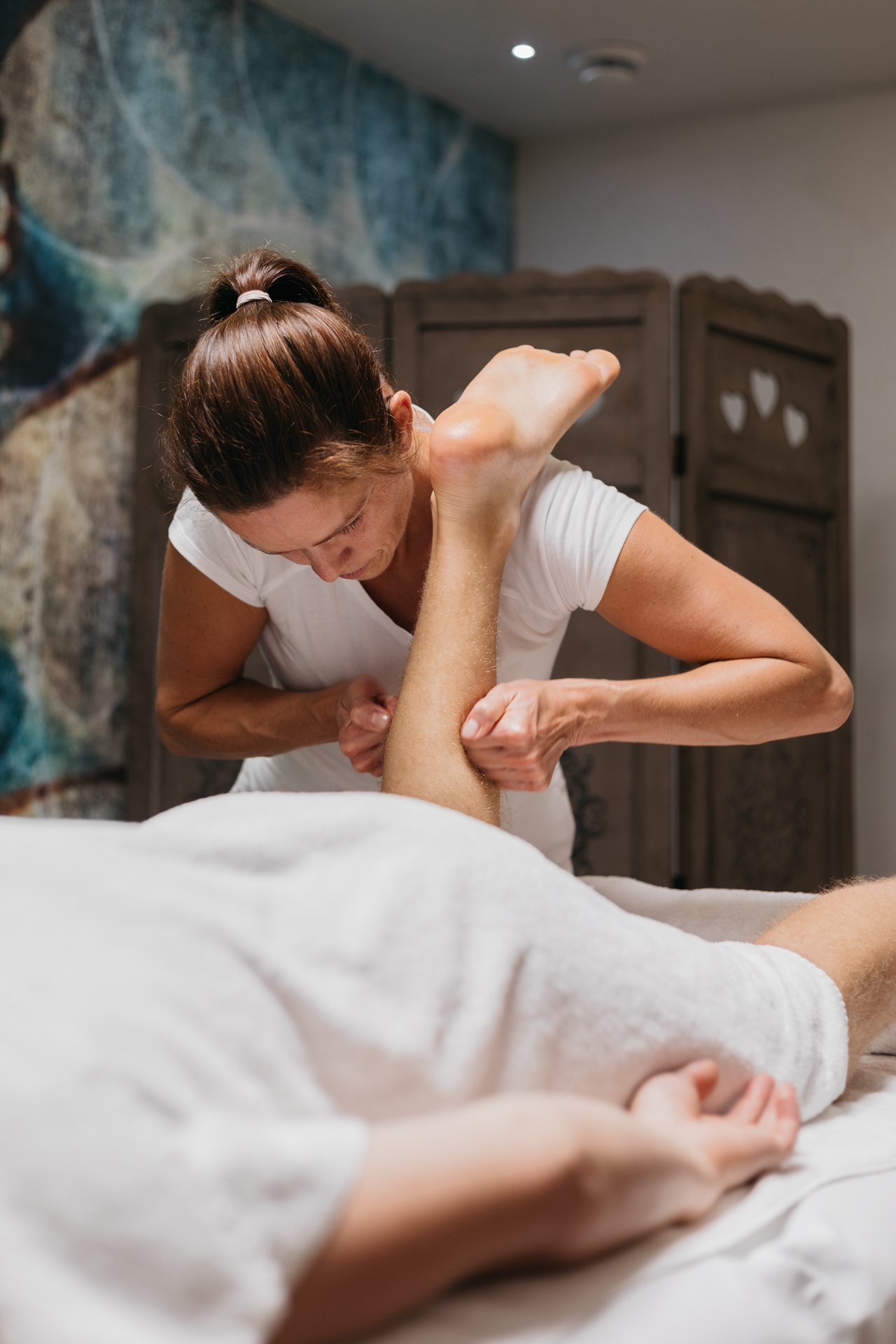 Alpinhotel Berghaus Massagen im Detail Wadl-Schmankerl - für leichte Beine