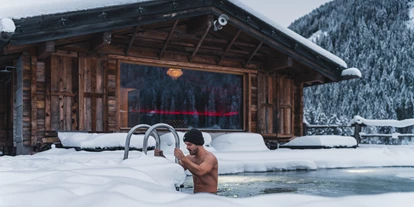 Wellnessurlaub - Fahrradverleih - Innsbruck - Eisbaden im Naturschwimmteich - Alpinhotel Berghaus