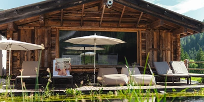 Wellnessurlaub - Fahrradverleih - Innsbruck - Außenblocksauna und Naturschwimmteich - Alpinhotel Berghaus