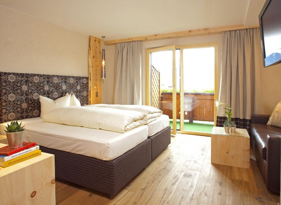 Hotel Tirol Zimmerkategorien Alpin Kuschelzimmer für 2 Personen 