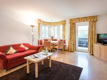 Inntalerhof - DAS Panoramahotel Zimmerkategorien Landhaus Familienappartement - mit Gartenzugang