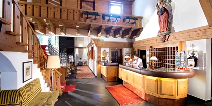 Wellnessurlaub - Fahrradverleih - Innsbruck - Empfangsbereich & Rezeption - Inntalerhof - DAS Panoramahotel