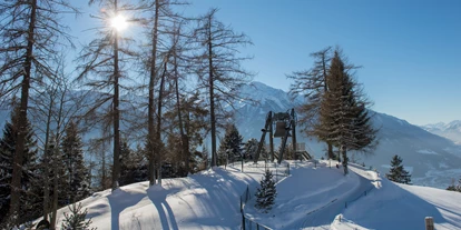 Wellnessurlaub - Fahrradverleih - Innsbruck - Die Friedensglocke im Alpenraum - bei uns im Garten - läutet täglich für den Frieden in den Alpenländern - Inntalerhof - DAS Panoramahotel
