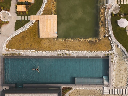 Wellnessurlaub - Fahrradverleih - Innsbruck - 25 Meter pures Schwimmvergnügen im Infinity Sporbecken - HELD - Hotel & SPA****s