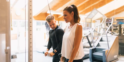 Wellnessurlaub - Babysitterservice - Fittnessraum im ...liebes Rot-Flüh mit Geräten von Technogym - Wellnesshotel ...liebes Rot-Flüh