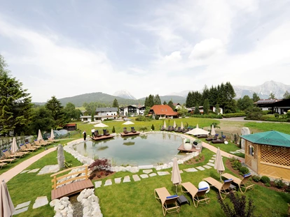 Wellnessurlaub - Fahrradverleih - Innsbruck - Garten mit Naturbadeteich - Wellnesshotel Schönruh - Adults Only