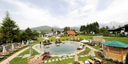 Wellnessurlaub - Tirol - Garten mit Naturbadeteich - Wellnesshotel Schönruh - Adults Only