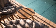 Wellnessurlaub - Pools: Infinity Pool - Sonnen Resort