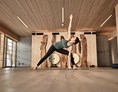 Wellnesshotel: Tägliche Yoga-Stunden im Rahmen des Aktivprogramm  - HUBERTUS Mountain Refugio Allgäu