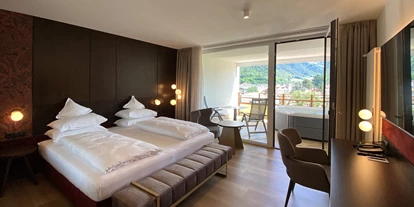 Wellnessurlaub - Oberbozen - Romantic Juniorsuite Whirlwanne - Dominik Alpine City Wellness Hotel