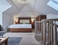 Wellnesshotel: Beispiele unserer Ausstattung der Schlafzimmer im Dachgeschoss. - Hotel EDELWEISS Berchtesgaden