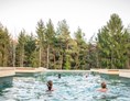 Wellnesshotel: Naturbadeteich im BIO | ORGANIC | SPA im Retter Bio-Natur-Resort - RETTER Bio-Natur-Resort