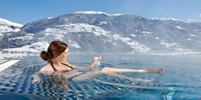 Wellnessurlaub - Dampfbad - 32° Infinity Outdoorpool - Alpin Family Resort Seetal****s