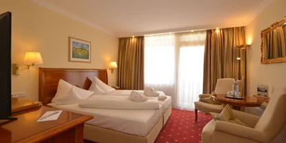 Wellnessurlaub - Schwanenstadt - Zimmerbeispiel DZ Comfort 26 qm - Hotel Schweizer Hof Betriebs-GmbH