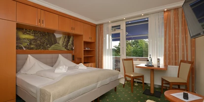 Wellnessurlaub - Schwanenstadt - Zimmerbeispiel DZ Superior 26 qm - Hotel Schweizer Hof Betriebs-GmbH