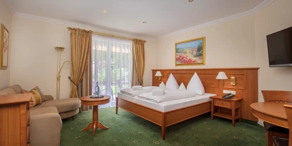 Wellnessurlaub - Schwanenstadt - Zimmerbeispiel DZ de Luxe Villa 34 qm - Hotel Schweizer Hof Betriebs-GmbH