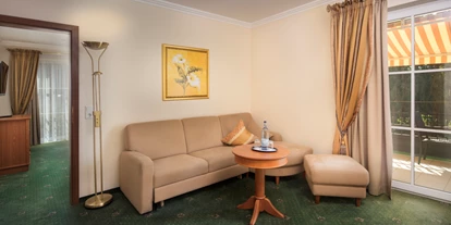 Wellnessurlaub - Schwanenstadt - Zimmerbeispiel Suite De Luxe Villa 49 qm - Hotel Schweizer Hof Betriebs-GmbH