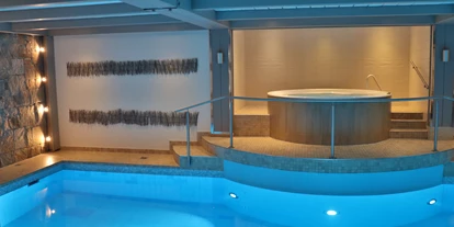 Wellnessurlaub - Hot Stone - Weisweil - Pool und Whirlpool im Souterrain im Ritter Spa - Hotel Ritter Durbach