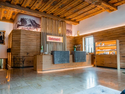Wellnessurlaub - Babysitterservice - Rezeption - Hotel Unterwirt