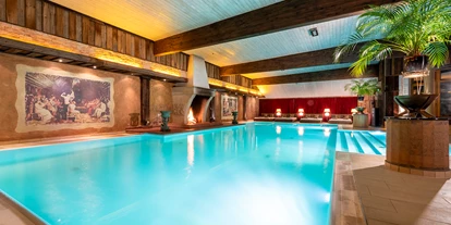 Wellnessurlaub - WLAN - Brandenburg - Innenpool mit Großkamin
 - Wellnesshotel Seeschlösschen