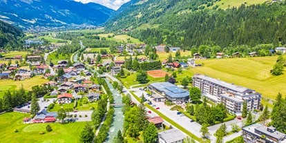 Wellnessurlaub - Day SPA - Altenmarkt im Pongau - Drohnenaufnahme Sommer: Hotel und Golfplatz - EUROPÄISCHER HOF Bad Gastein