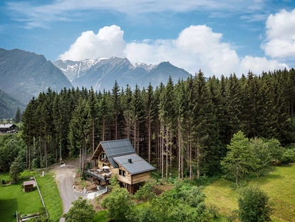 Wellnessurlaub - Maurach - Die Gassner Baumhaus.Lodge - 147 exklusive Quadratmeter zum Kuscheln und Nesteln  - Hotel Gassner****Superior