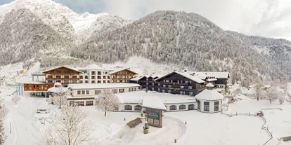 Wellnessurlaub - Parkplatz: kostenlos in Gehweite - Grießen (Leogang) - Hotel aussen - Hotel Gut Brandlhof