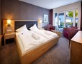 Wellnesshotel: Zimmerbeispiel Komfort-Doppelzimmer Villa Quisisana  - Göbel's Hotel Quellenhof