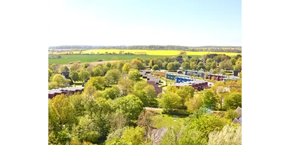 Wellnessurlaub - Schleswig - Ausblick über den Ferienhauspark Asgard im Dampland - Ostseehotel Midgard in Damp