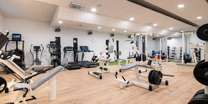 Wellnessurlaub - Babysitterservice - Fitness Bereich - Walliserhof Grand-Hotel & Spa