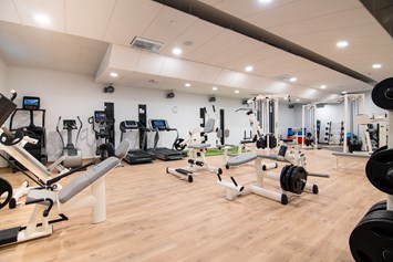Wellnesshotel: Fitness Bereich - Walliserhof Grand-Hotel & Spa