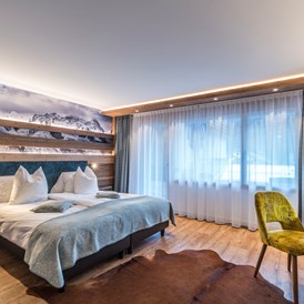 Wellnesshotel: Doppelzimmer Alpin Superieur mit Matterhornblick und für 3 Personen geeignet - Hotel Hemizeus und Iremia Spa