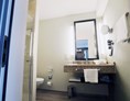 Wellnesshotel: Badezimmer in der Comfort-Kategorie - COURT HOTEL
