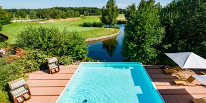 Wellnessurlaub - Lomi Lomi Nui - Grabau (Kreis Herzogtum Lauenburg) - Außenpool - Castanea Resort Hotel