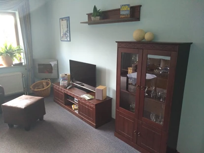 Wellnessurlaub - Babysitterservice - Wohnzimmer ein unsere Ferienwohnungen - Landhotel Grimmeblick ****