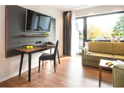 Wellnessurlaub - Verpflegung: Frühstück - Kall - Komfort Suite - Wohnzimmer - Sporthotel Grafenwald