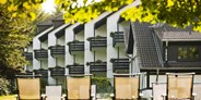 Wellnessurlaub - Hotel-Schwerpunkt: Wellness & Beauty - Außenansicht Hotel - Sporthotel & Resort Grafenwald