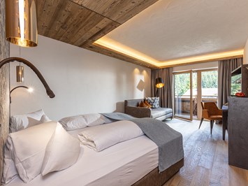 Der Alpbacherhof ****s Natur & Spa Resort Zimmerkategorien Wohnkomfortzimmer Naturblick