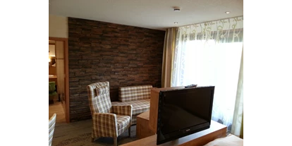 Wellnessurlaub - Day SPA - Rutesheim - Sitzecke Zimmer Delux - Wellness-Hotel Cafe Talblick