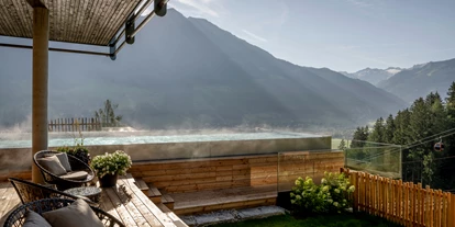Wellnessurlaub - Day SPA - Altenmarkt im Pongau - Infinitypool freischwebend endend - DAS.GOLDBERG