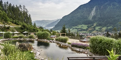 Wellnessurlaub - Day SPA - Altenmarkt im Pongau - Naturbadesee im Spa Garten - DAS.GOLDBERG