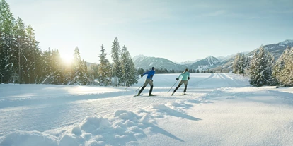 Wellnessurlaub - Hunde: auf Anfrage - Schöder - Langlaufen in Ramsau am Dachstein Direkt vor dem Hotel Annelies steigen Sie in das Loipennetz von Ramsau am Dachstein ein. Entdecken Sie die wunderschönen Loipen, egal ob im klassischen Stil oder Skating und erkunden Sie ein der schönsten Langlaufregionen in Österreich. - Hotel Annelies
