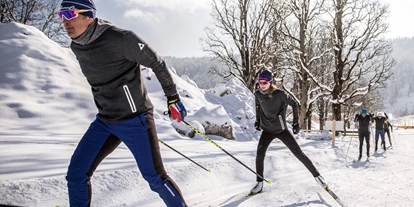 Wellnessurlaub - Hunde: auf Anfrage - Schöder - 
Unser Langlauf-Angebot für Sie in Ramsau am Dachstein:
Die Langlaufschule Annelies, in der Region Schladming-Dachstein, eignet sich perfekt für jeden der dem nordischen Sport (noch) näher kommen möchte.
Für Einsteiger, Fortgeschrittene bis hin zum Rennläufer bieten wir Ihnen hier in Ramsau am Dachstein professionelle Langlaufkurse oder Privatstunden gepaart mit Herzlichkeit und Freude am nordischen Sport.
Besonderheit: Unsere Langlauftrainer sind aktive oder ehemalige Rennläufer sowie Langlaufprofis. Gemeinsam mit Ihnen gestalten sie ein intensives und individuelles Langlaufkurs Programm für einen schnellen Lernerfolg.
Lernen Sie Langlaufen lieben – in der hauseigenen Langlaufschule des Hotel Annelies!
 - Hotel Annelies